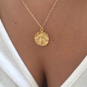 Gold bee necklace